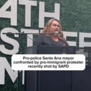 Preview thumbnail for Santa Ana mayor Valerie Amezcua confronted by a pro-immigrant protestor at a public event.