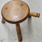 Preview thumbnail for What is this three legged stool with a ?handle? that has a hole in it?