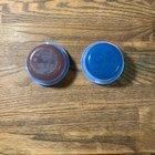 Preview thumbnail for The one on the left is fully colonized and looks fine from the top and the right one is just a clean agar. Is it normal for it to change color or do I have bacterial contam?