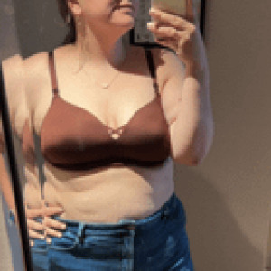 Preview thumbnail for Showing off her bra and toes in the hotel mirror