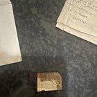 Preview thumbnail for What is this tag, numbered on one side and “Deaths” on the other side.  Found in a collection of saved paperwork from the early 1900s.