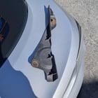 Preview thumbnail for This part was hanging off the undercarriage of my girlfriend's 2010 Mazda3. Any idea what it is &amp; if it is important?